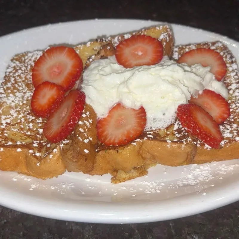 French Toast with strawberries and whipped cream