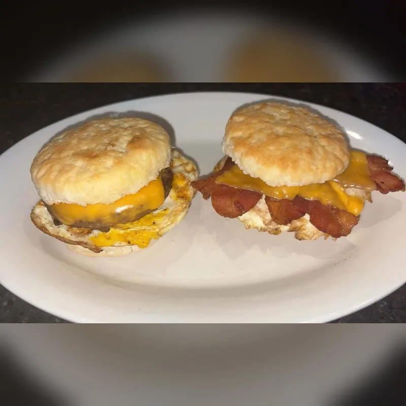Breakfast Sliders on biscuits with egg, bacon and cheddar cheese