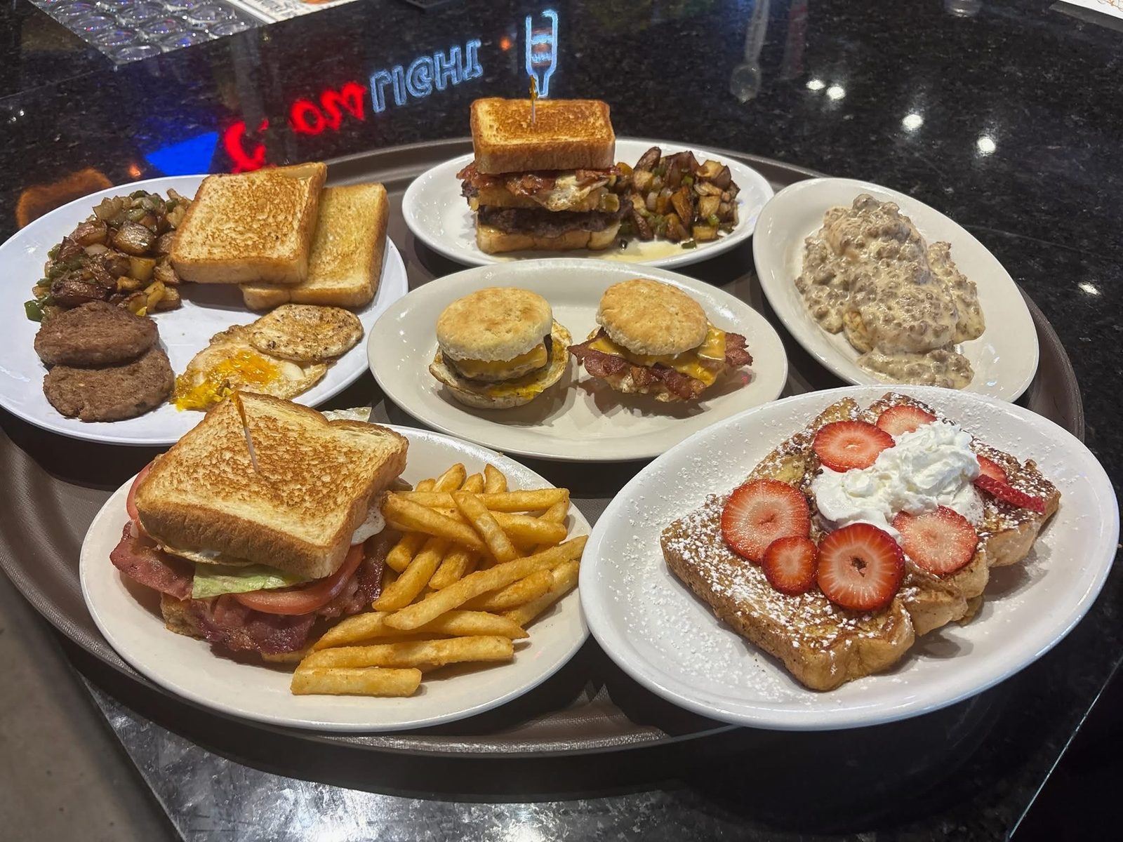 Brunch spread: Early Bird, Hangover Burger, Breakfast Sliders, Biscuits and Sausage Gravy, Breakfast BLT and French Toast
